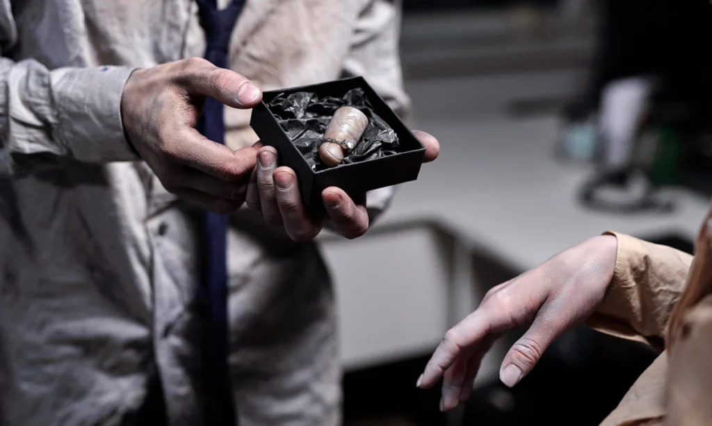 A warped gift box with curled edges, demonstrating the negative effects of poor humidity control in box production.