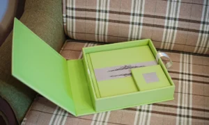 A quality control expert inspecting a newly made luxury gift box, representing the final step of the gift box production process.